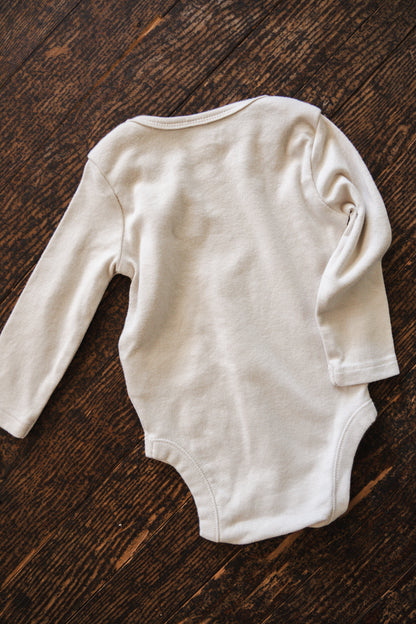 Cream Long Sleeve Bodysuit: 3-6mos